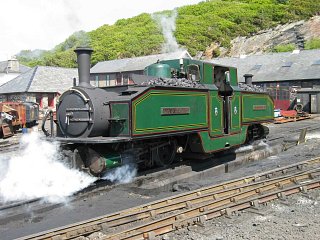 Now with coal instead of oil bunkers. The original dome covers have made a reappearance whilst the chimney caps are painted over