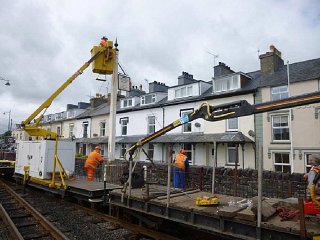 Inspecting the wooden signal post